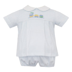 Baby outfit with checkered shirt with embroidered train design and shorts on a white background