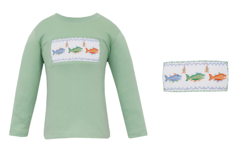 Green long-sleeve shirt with smocked fish design on a white background