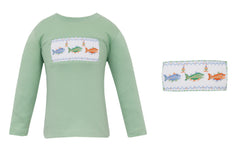 Green long-sleeve shirt with smocked fish design on a white background