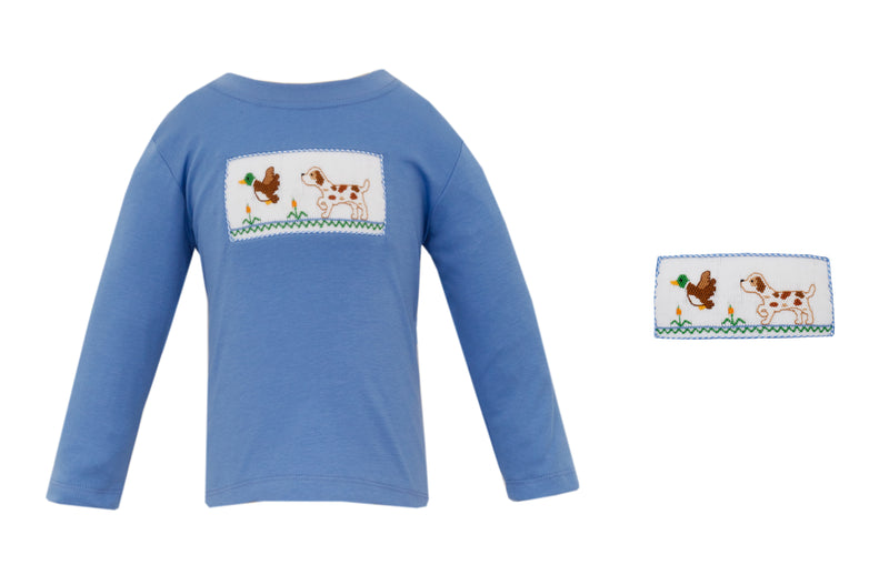 Blue long-sleeve shirt with smocked hunting dog and duck design on a white background