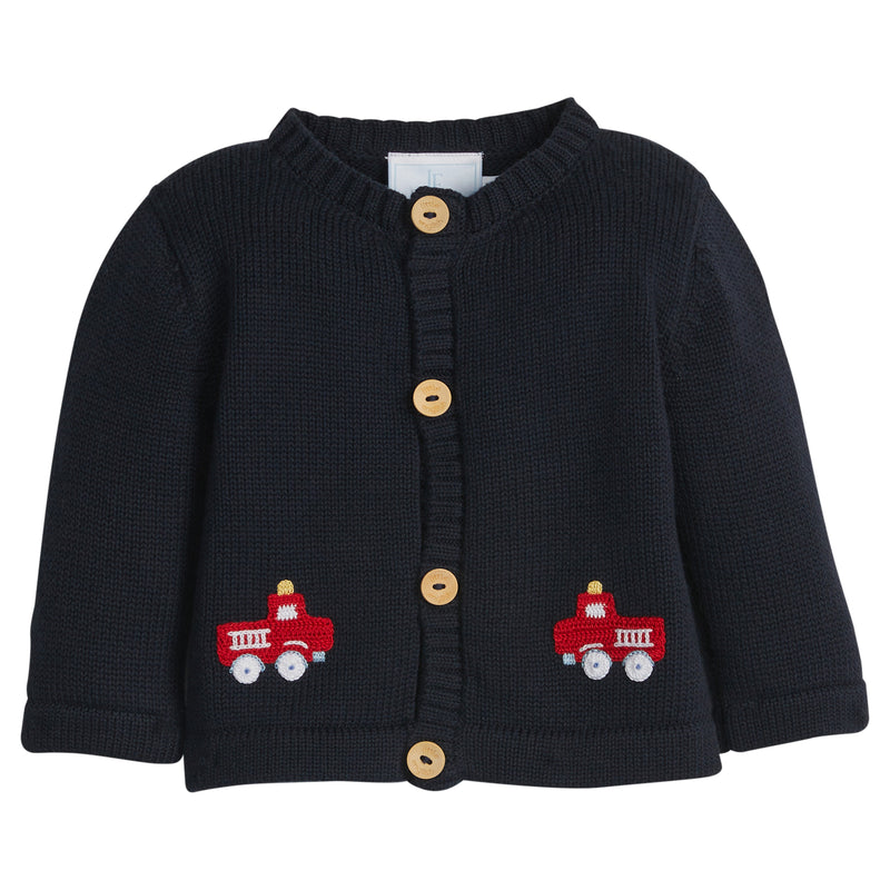 Navy baby knit cardigan with red fire truck designs and wood buttons on a white background